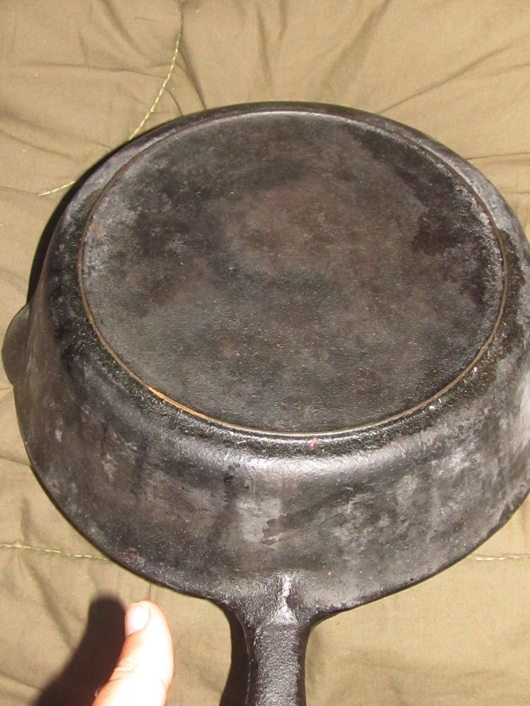 Old cast iron lid with dots