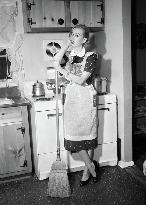 1950s-tired-housewife-in-apron-standing-vintage-images.jpg