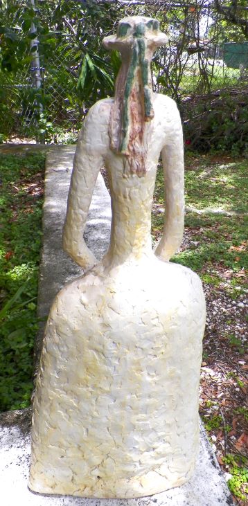 ART STATUE SEVER THIN WOMAN WITH FLOWERS 7AA.JPG