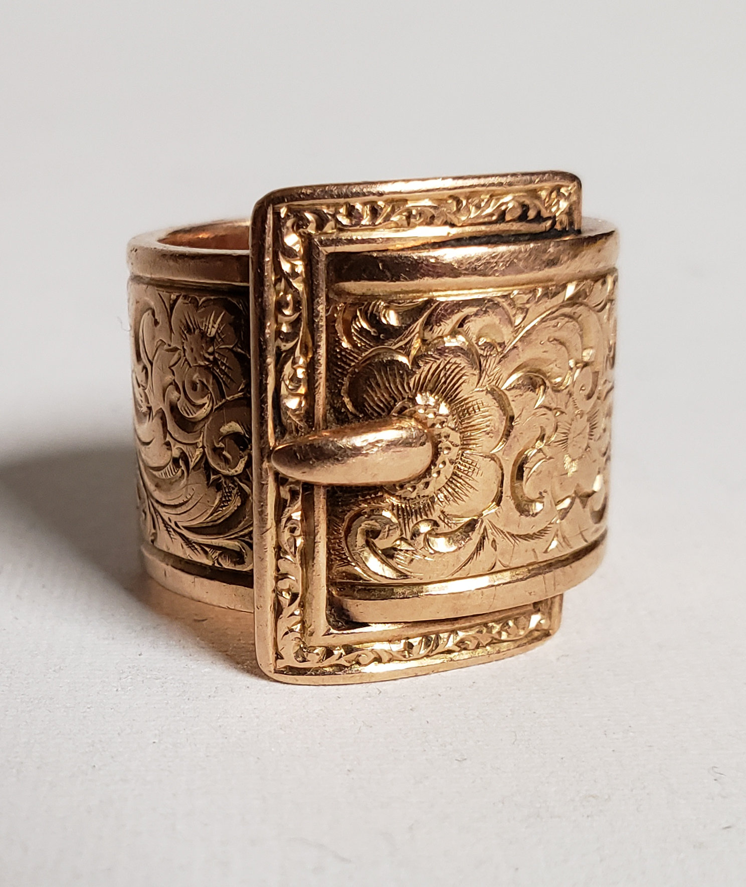 Rose gold buckle on sale ring