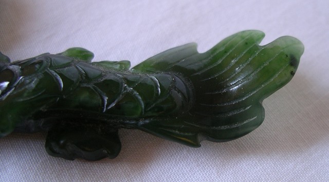 Green Carved Stone Dragon Tail Detail.jpg