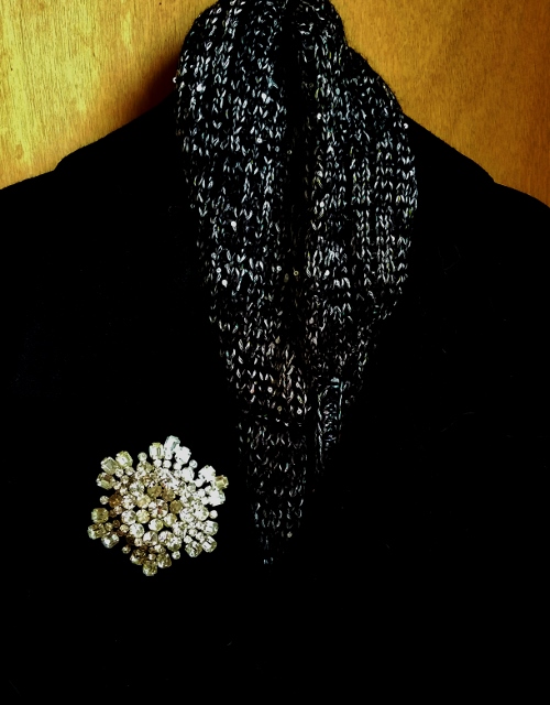 Huge brooch on coat (500x640).jpg