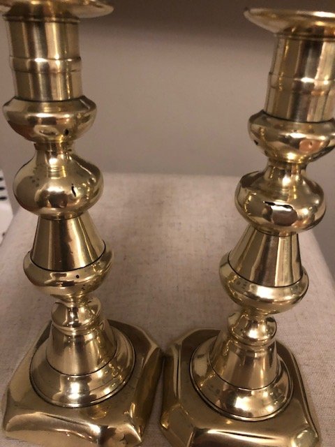 Lot - Pair of brass push up candlesticks with diamond, beehive and