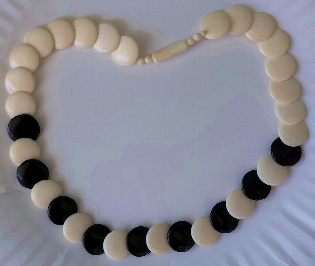 ivory and plastic necklace.jpg