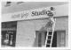 Milt painting Austine Studios sign in Boulder City Nevada approx.  1983 (80x57).jpg