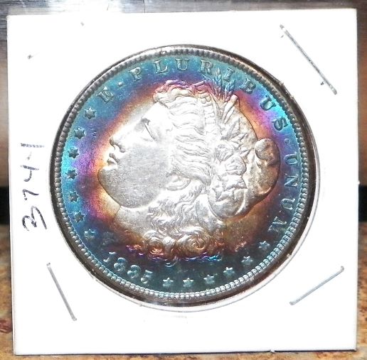 MONEY MORGAN SILVER DOLLAR 1885 BULLSEYE TONING 1AA.JPG