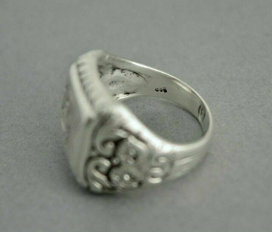 What can you tell me about this 835 silver signet ring Antiques