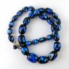 Blue_Green_Foil_black_beads_neck_2.jpg