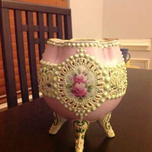 Pink porcelain vase with raised ornamentation