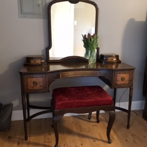 I just finished restoring this Berkey and Gay vanity. Can anyone help me gauge this old it is?