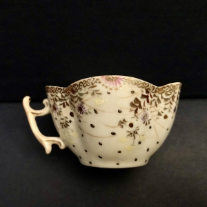 antique tea cup of unknown origin