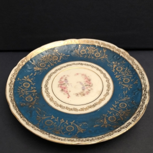 antique saucer of unknown company