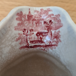 Red transferware creamer