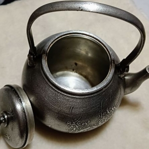 silver teapot inside