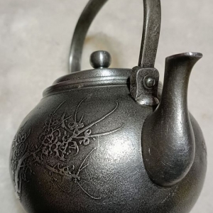 silver teapot spout