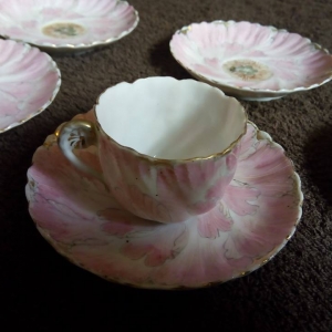 A close up of a cup and saucer